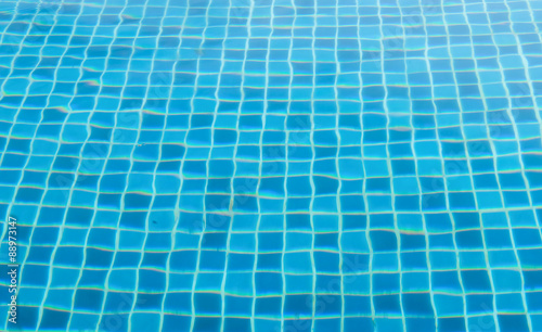 Blurry swimming pool floor pattern