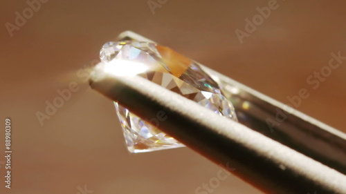 Diamond Seen Close Up With Pincers