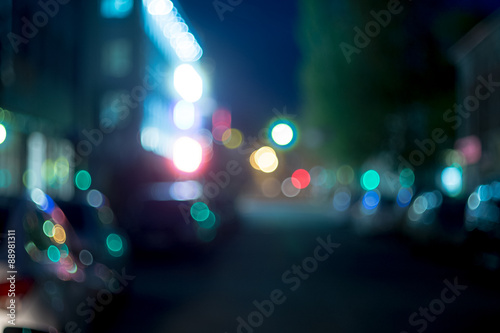 Defocused night street in blue color © mettus