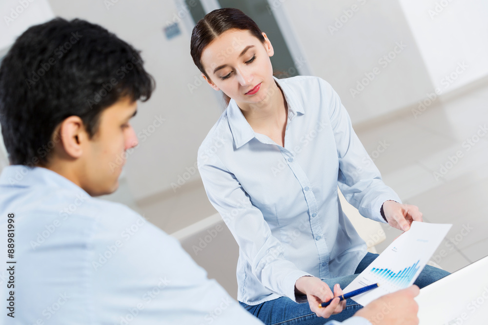 Two young people working as partners Two young people working as partners