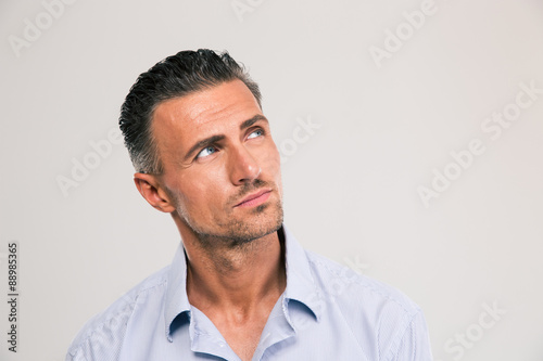 Confident man looking away at copyspace