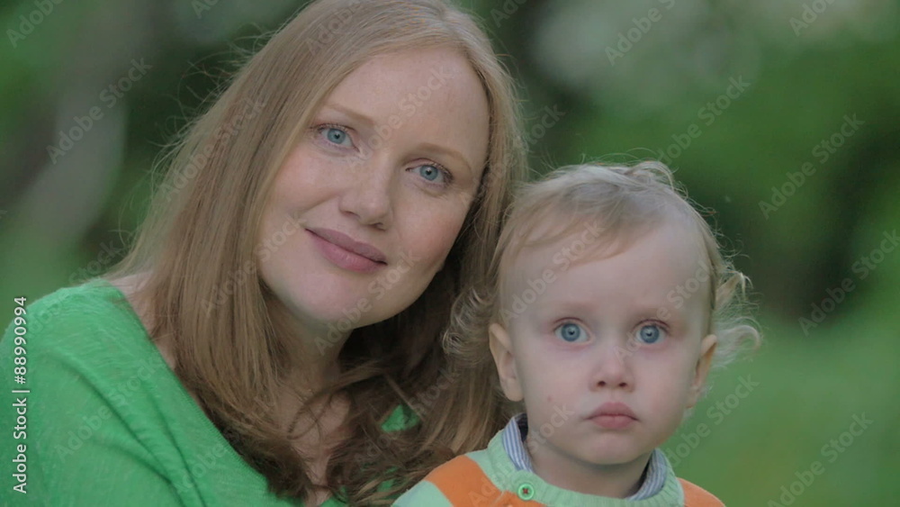 Outdoor portrait of happy mother and little son Outdoor portrait of happy mother and little son