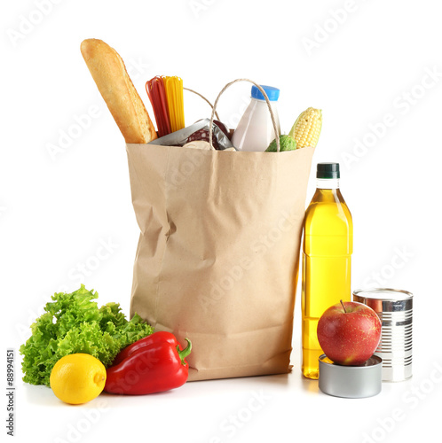 Paper bag with food isolated on white