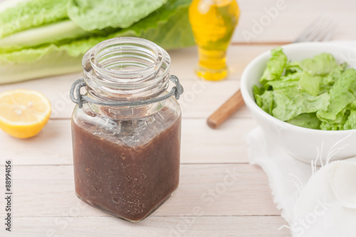 balsamic vineaigrette salad dressing in a glass container on