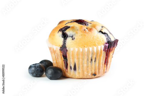Wallpaper Mural Tasty blueberry muffin isolated on a white