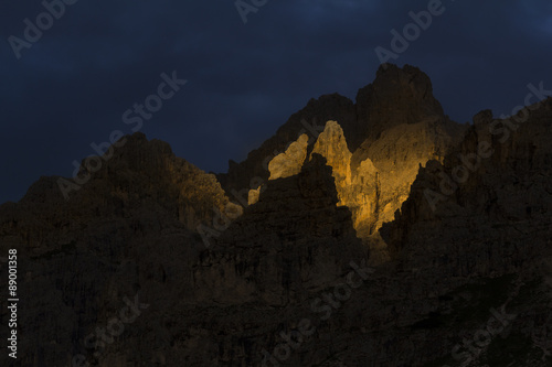 Dramatic light t sunset in Dolomites Mountains