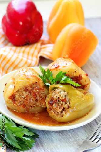 Baked peppers stuffed with meat, rice and vegetable