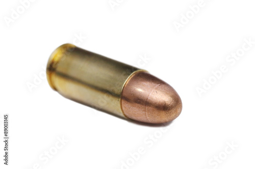 9mm bullet on white background
