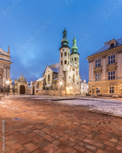 Fototapeta Naklejka Na Ścianę i Meble -  Krakow, Poland, romanesque church of Saint Andrew on Mary Magdalene square in blue hour, winter morning.