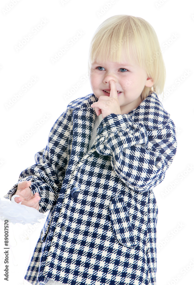 Charming girl in a checkered coat. Charming girl in a checkered coat.