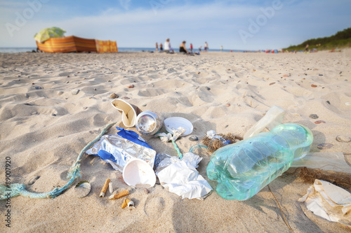 Fototapeta Naklejka Na Ścianę i Meble -  Garbage on beach left by tourist, environmental pollution concept.