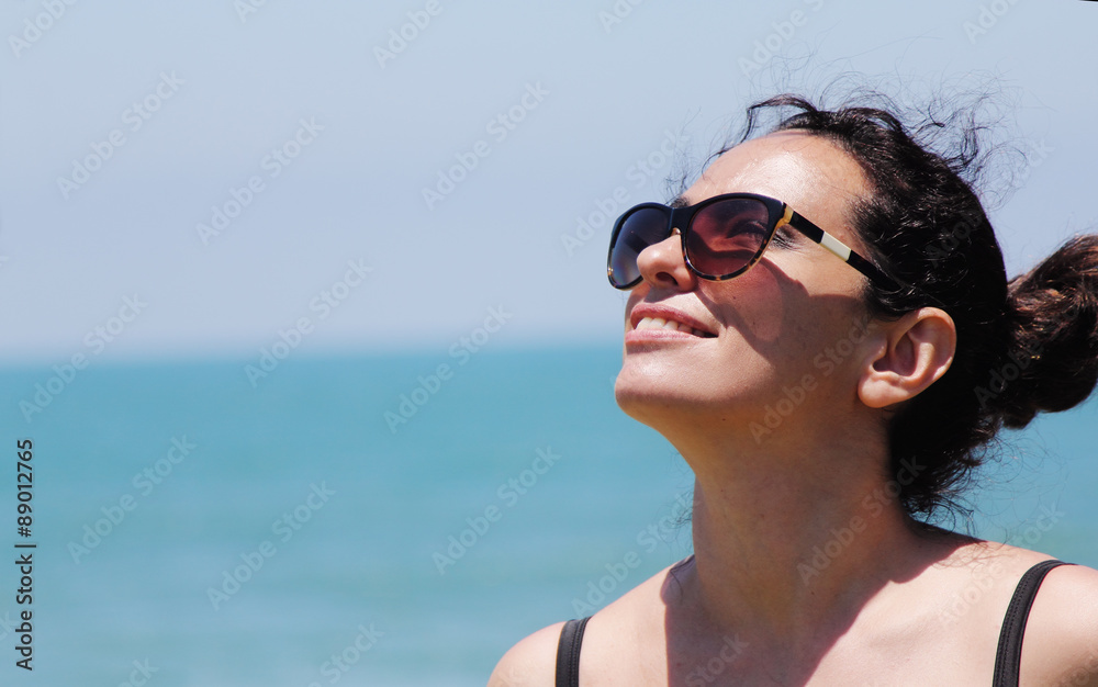 beautiful 35 years old woman walking on the beach beautiful 35 years old woman walking on the beach