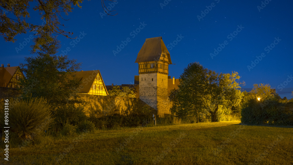 Dinkelsbuhl by night. Dinkelsbuhl is one of the archetypal towns on the German Romantic Road. Dinkelsbuhl by night. Dinkelsbuhl is one of the archetypal towns on the German Romantic Road.