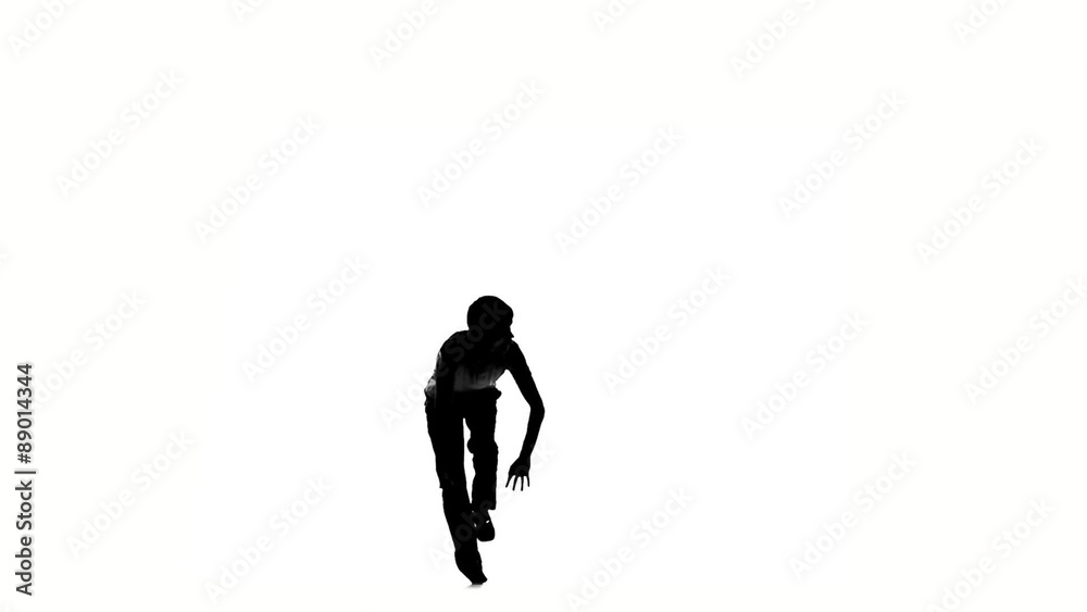 Young, man doing brake dancing movements, on white, slow motion Young, man doing brake dancing movements, on white, slow motion