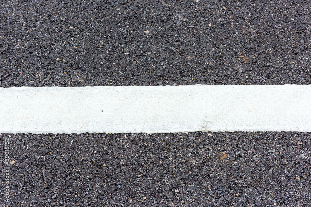 Fototapeta premium New asphalt texture with white line