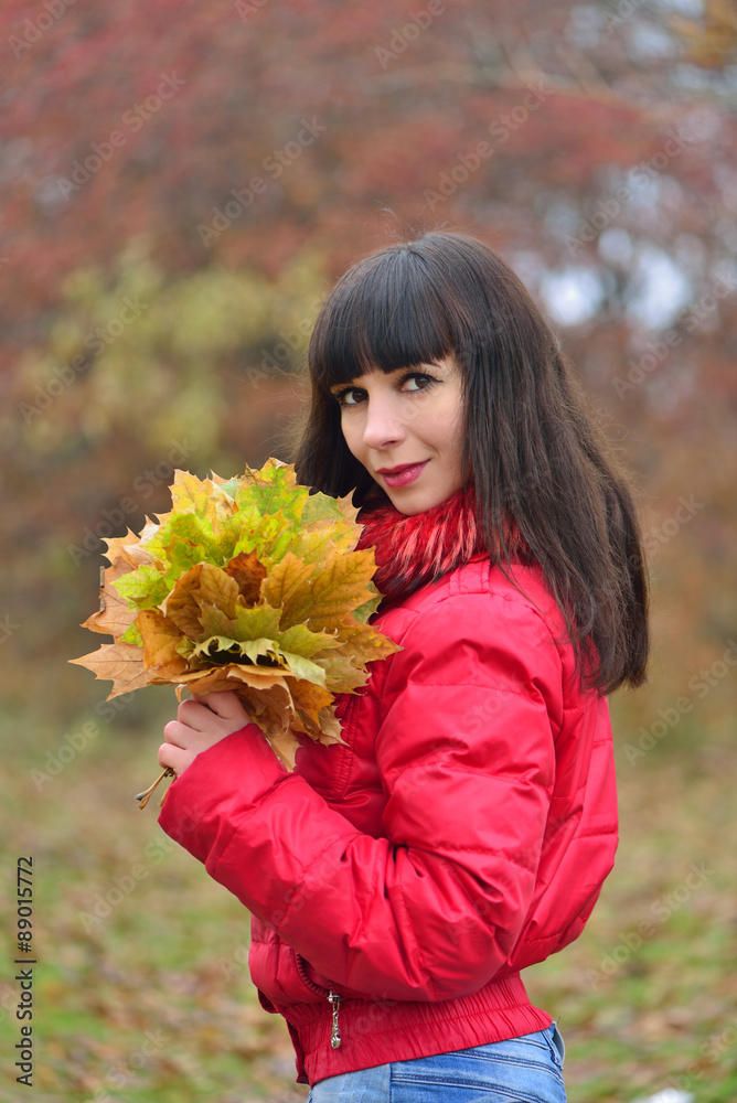Girl with autumn maple leaves Girl with autumn maple leaves