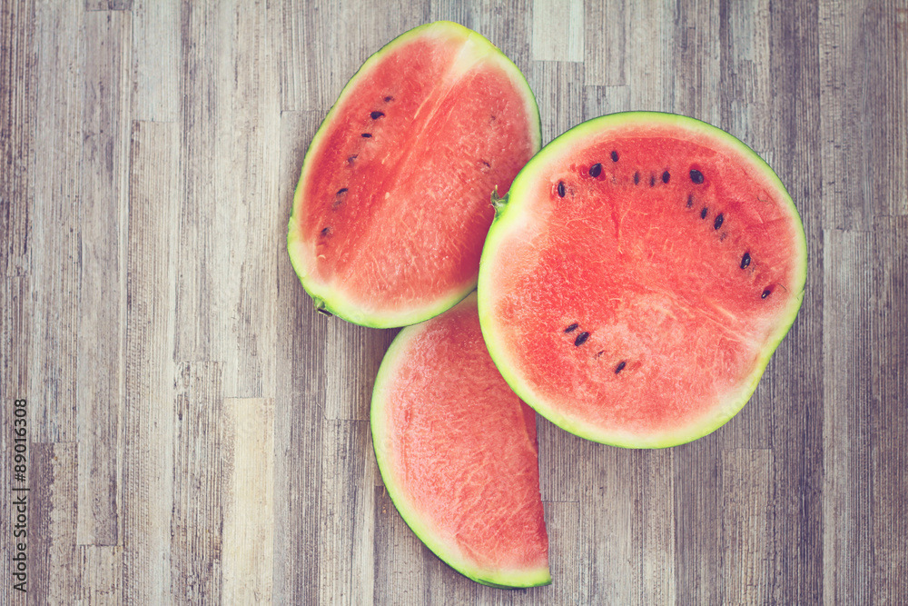 Watermelon on wooden background. Haze image Watermelon on wooden background. Haze image