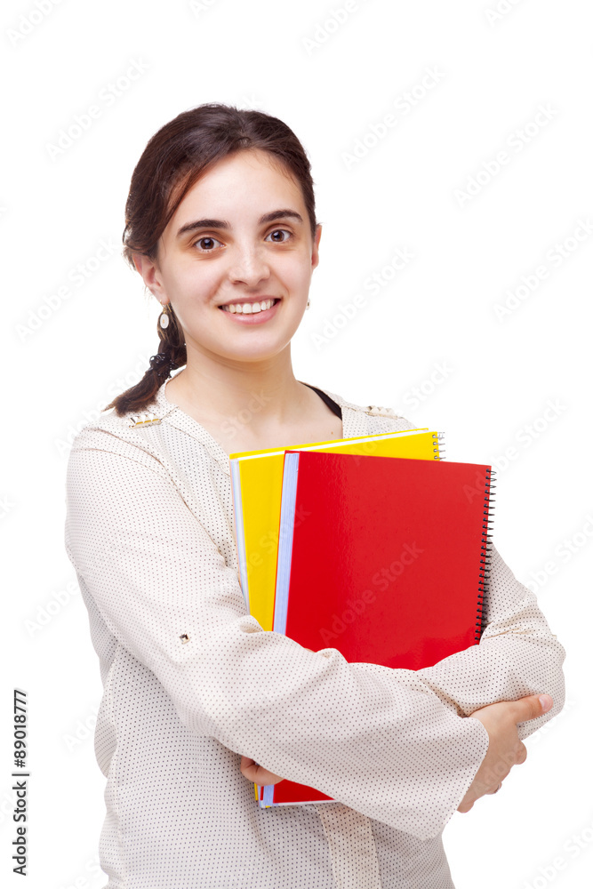 Cute female student looking to the camera, isolated on white bac Cute female student looking to the camera, isolated on white bac