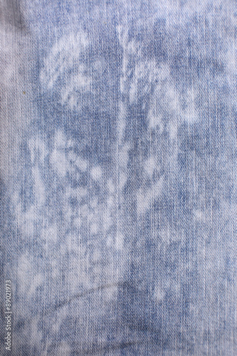 torn old blue jeans background