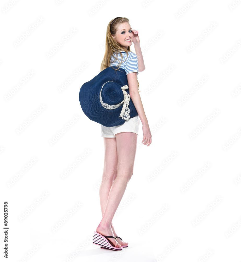 Full body young leisure woman with hat posing
Full body young leisure woman with hat posing