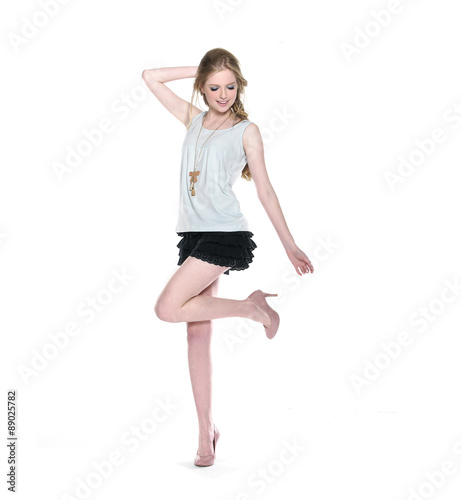 Full body beautiful young woman in trousers, shorts posing