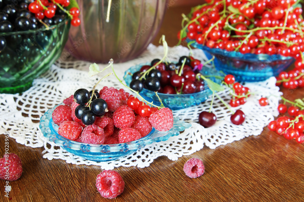 Still life with various fresh ripe berries on the table Still life with various fresh ripe berries on the table