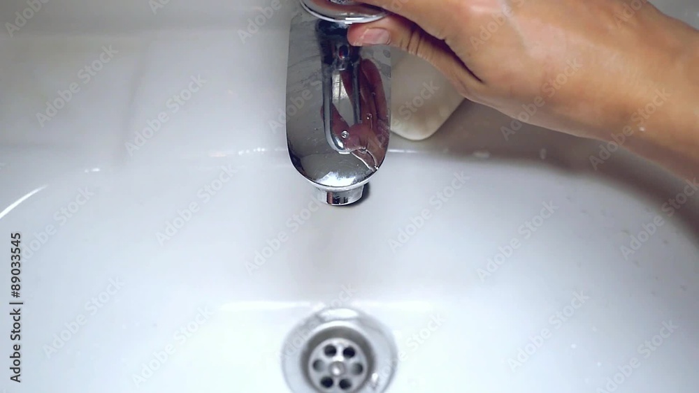Washing of hands with soap under running water. Washing of hands with soap under running water.