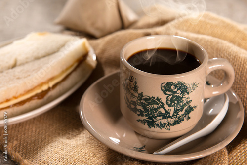 Traditional Malaysian Chinese dark coffee and breakfast