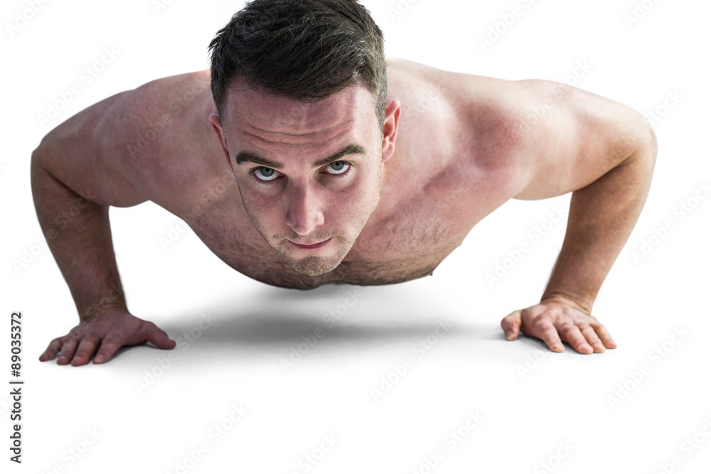 Strong bodybuilder doing press up Strong bodybuilder doing press up