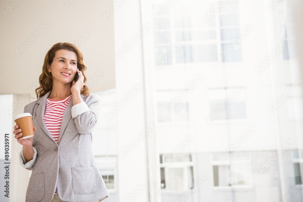 Casual businesswoman having a phone call Casual businesswoman having a phone call