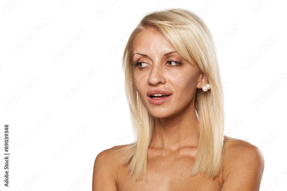 Fototapeta premium young woman without makeup posing in the studio