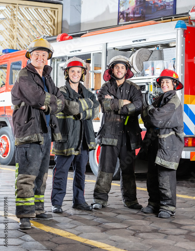 Obraz na plátně Confident Firefighters Standing Arms Crossed
