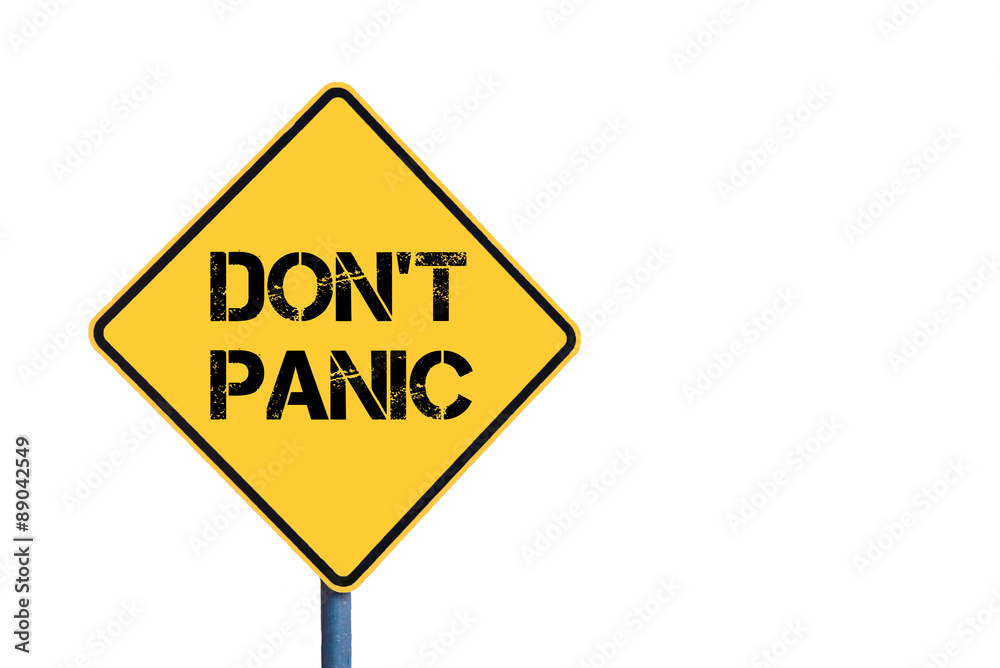 Yellow roadsign with Don't Panic message