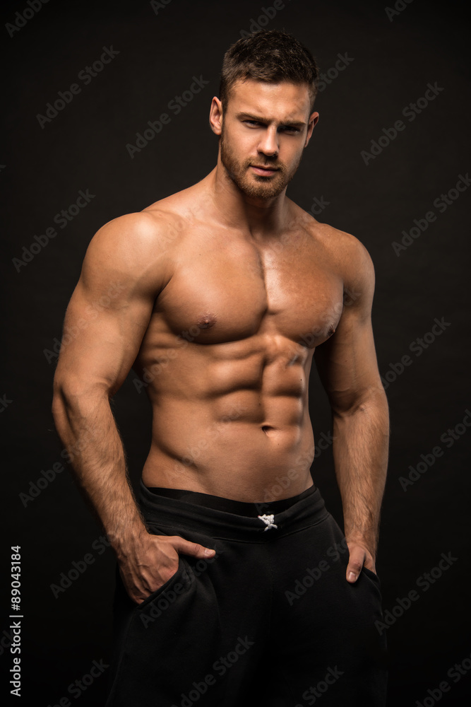 Muscled male model in studio
