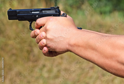 Shooting with a handgun