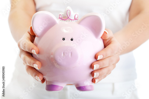 Woman holding pig money-box