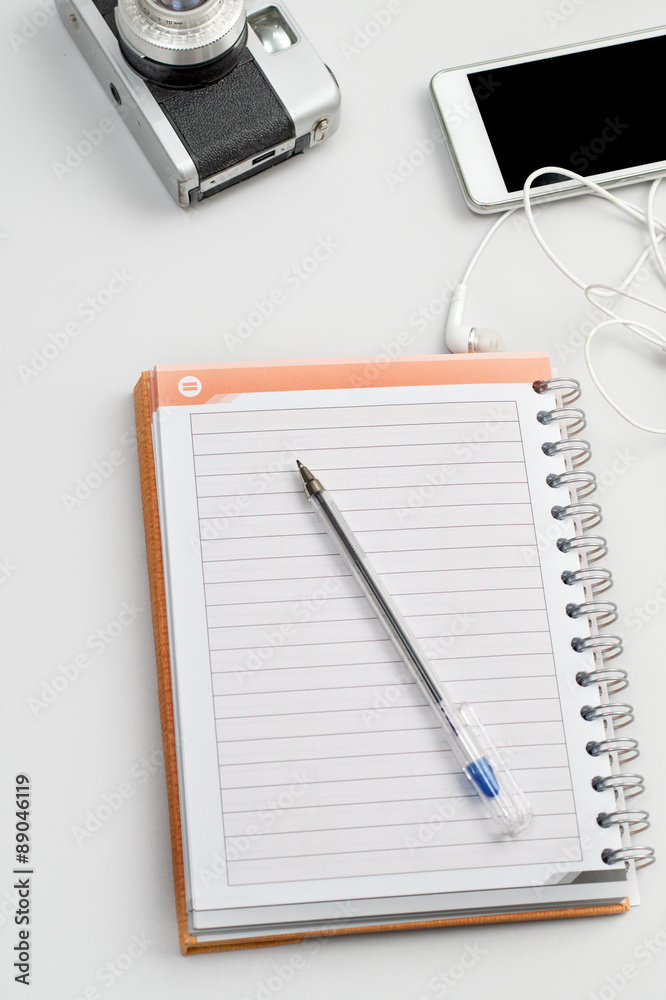 work place with phone and notepad work place with phone and notepad