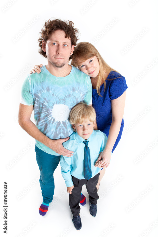 Caucasian family from father, mother and son, portrait on white background, full-length Caucasian family from father, mother and son, portrait on white background, full-length