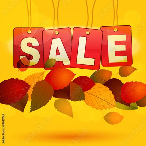 Sale tags with autumn leafs