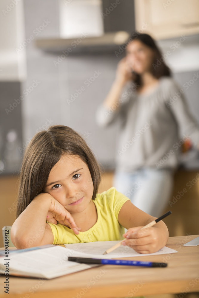 mother and daughter doing homework