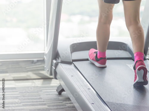 Treadmill running in gym