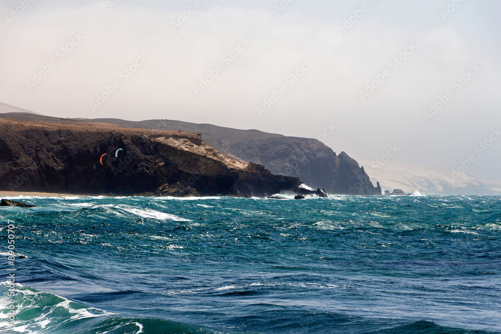 Sea surf on the rocks in the   La Pared on Fuerteventura