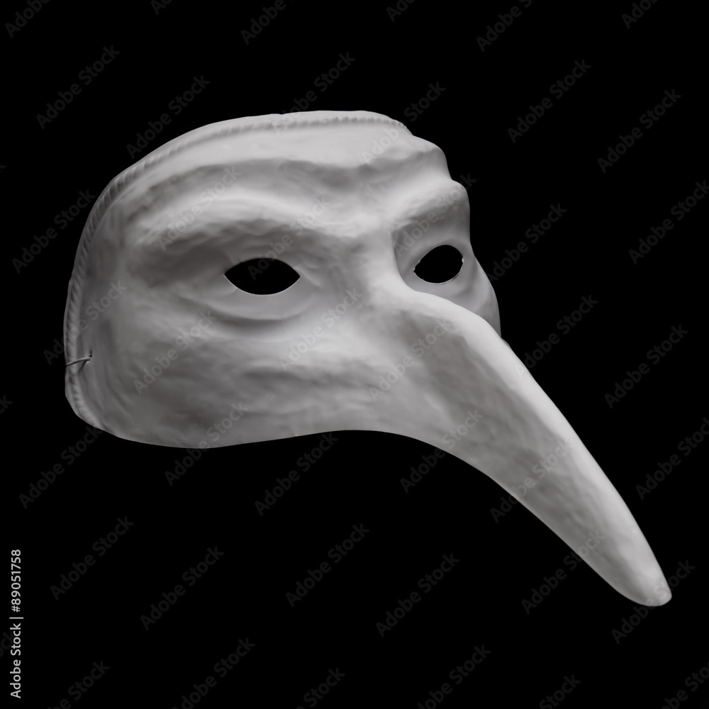 Naklejka premium White dell'arte mask isolated on black background