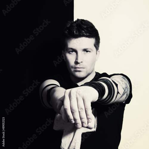 Young handsome man. Rock style