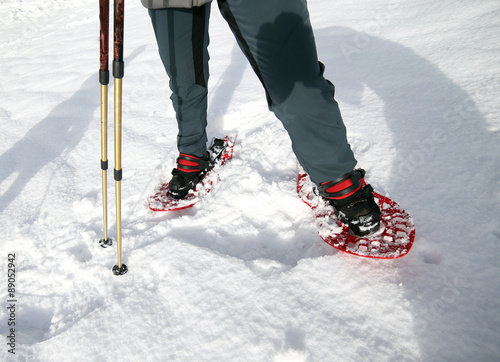 snowshoeing in the mountains on the white soft snow