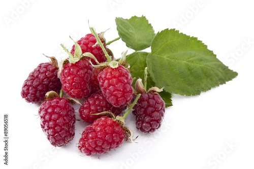 natural raspberries isolated on white