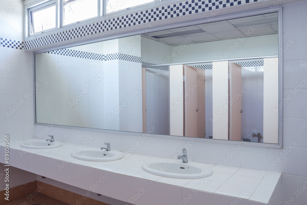 Bathroom at office.Handbasin and mirror in toilet - obrazy, fototapety, plakaty 