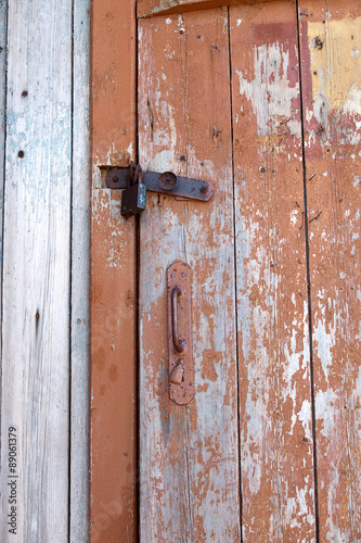 Old doors are closed on the lock