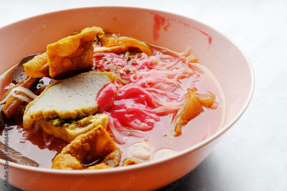Yong tau foo - Asian noodle in the red soup Yong tau foo - Asian noodle in the red soup
