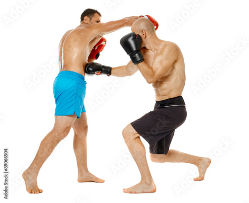 Kickboxers sparring on white © Xalanx